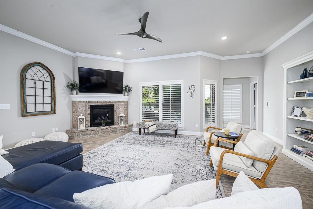 Tall ceilings, fireplace and statement lighting at 24315 W 76th Street, Shawnee, KS 66227