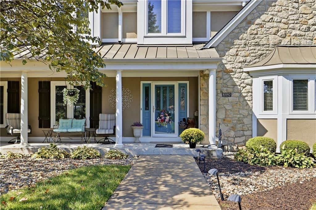 Covered front porch at 15592 S Greenwood Street, Olathe, KS 66062
