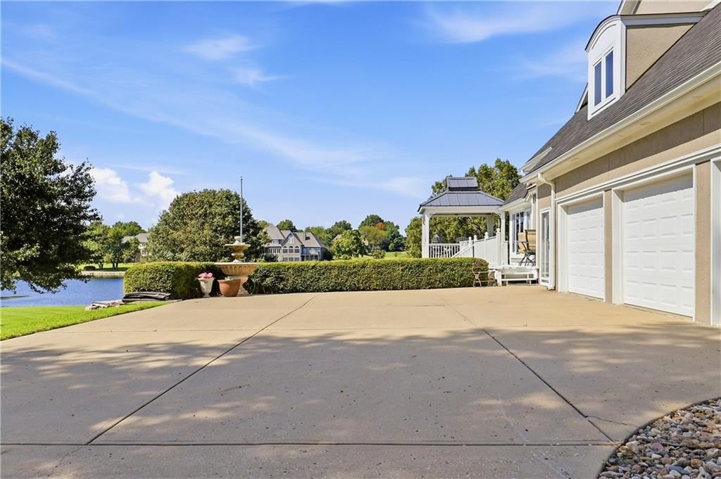 Concrete driveway and concrete patio at 15592 S Greenwood Street, Olathe, KS 66062