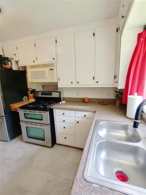 10704 BALES Avenue — photo 9