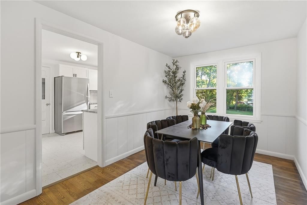 Statement lighting and wainscoting or board and batten at 5909 Melrose Lane, Shawnee, KS 66203