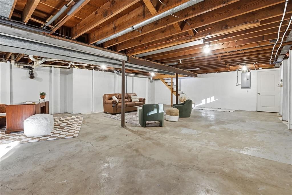 Finished basement and staircase at 5909 Melrose Lane, Shawnee, KS 66203