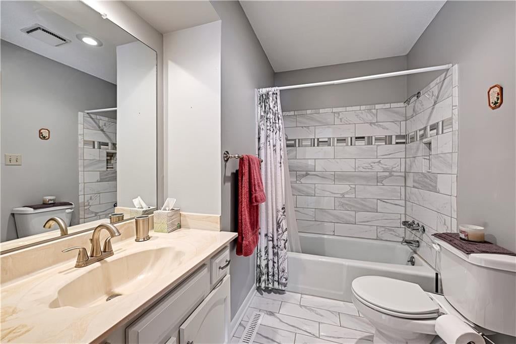 Tiled shower at 9623 Reeder Street, Overland Park, KS 66214