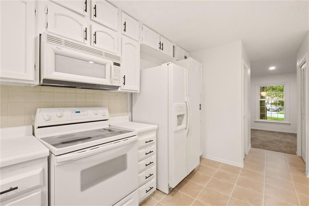 10106 NW Mirror Lake Drive — photo 12