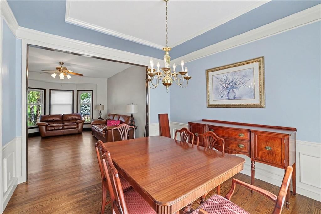 Statement lighting and wainscoting or board and batten at 9913 W 125th Terrace, Overland Park, KS 66213
