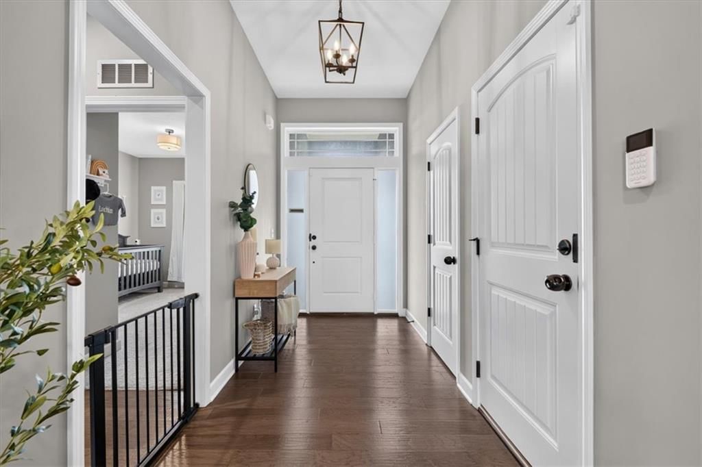 Wainscoting or board and batten and white trim at 504 Bentwater Drive, Raymore, MO 64083