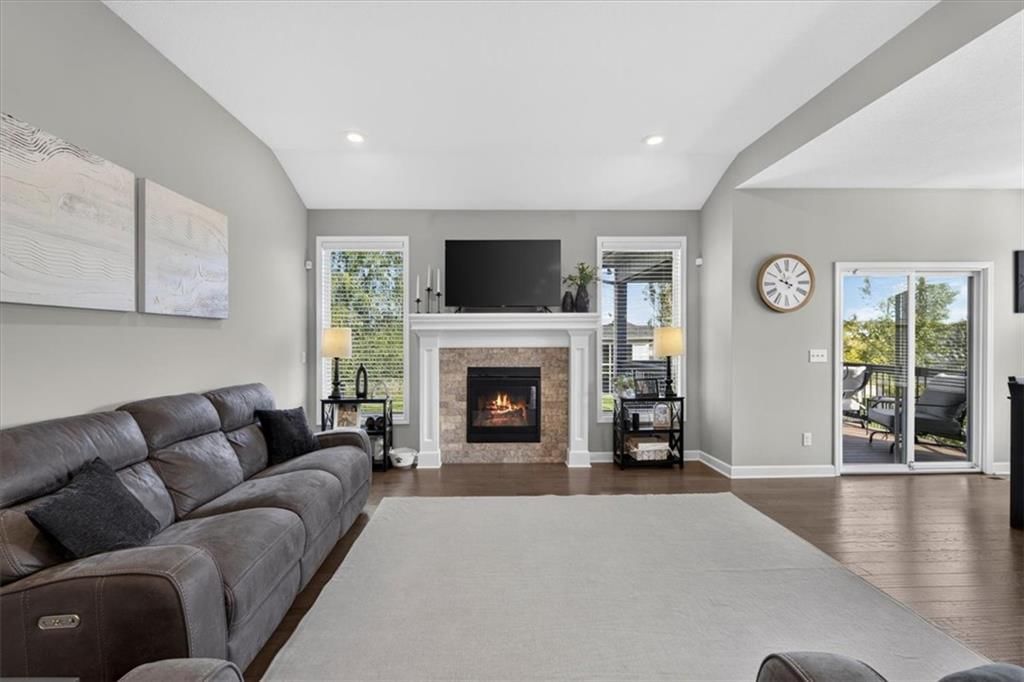 Modern, tall ceilings and fireplace at 504 Bentwater Drive, Raymore, MO 64083