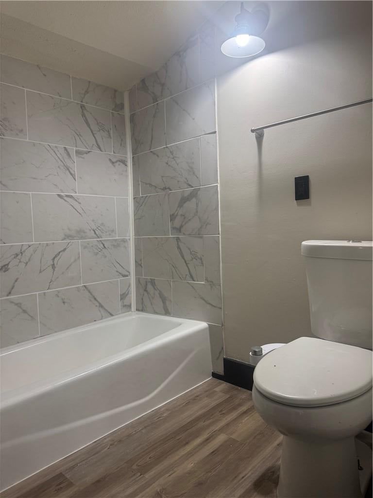 Tiled shower and renovated bathrooms at 547 Orchard Place, Excelsior Springs, MO 64024