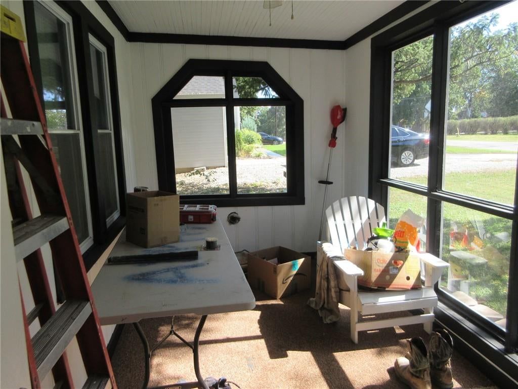 Sunroom and black window frames at 428 E Gudgell Avenue, Independence, MO 64055
