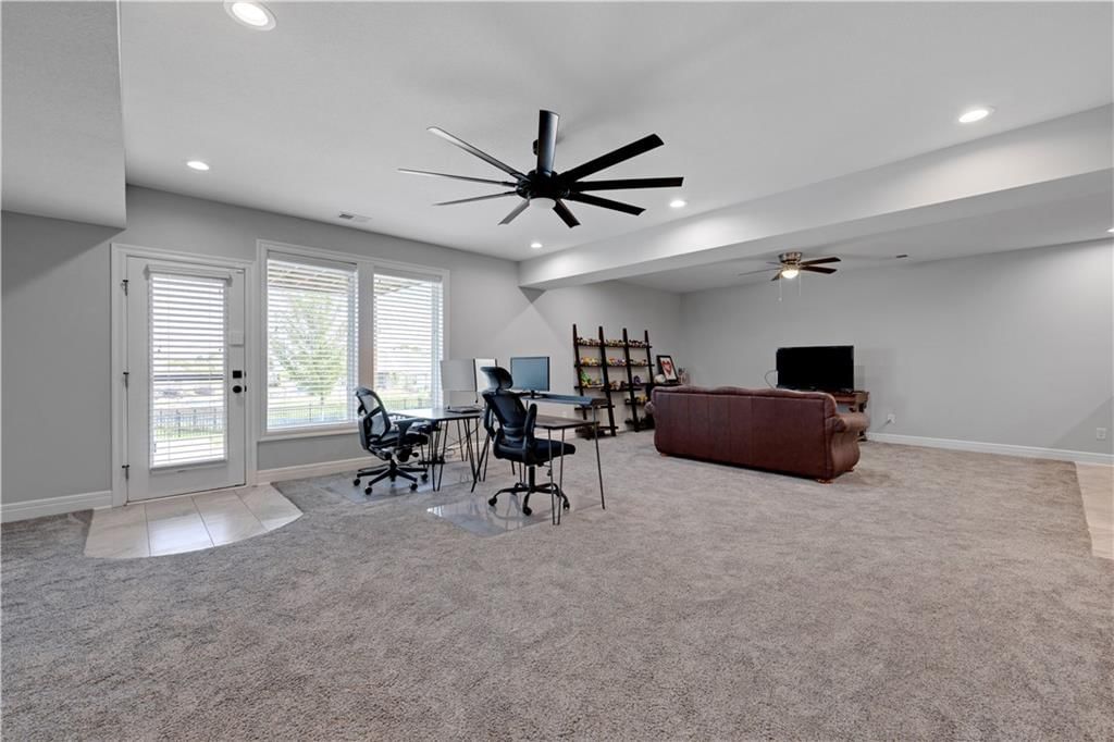 Big backyard, fenced yard and mature trees at 8311 Pickering Street, Lenexa, KS 66227