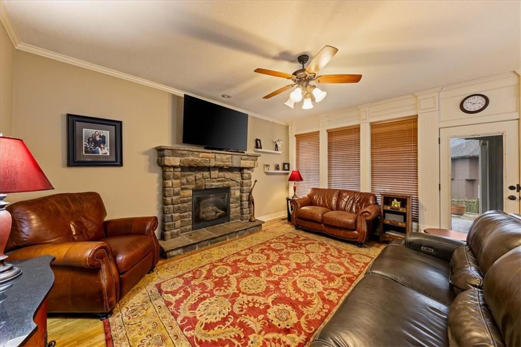 Fireplace and stone fireplace at 23716 W 52nd Terrace, Shawnee, KS 66226