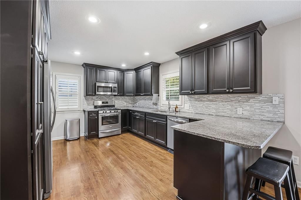 Photo 13: stainless steel appliances, 2230 W 71st Street, Prairie Village, KS 66208