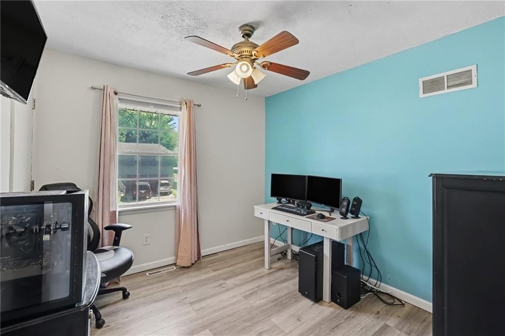Home office and accent wall at 2018 E Mohawk Court, Olathe, KS 66062
