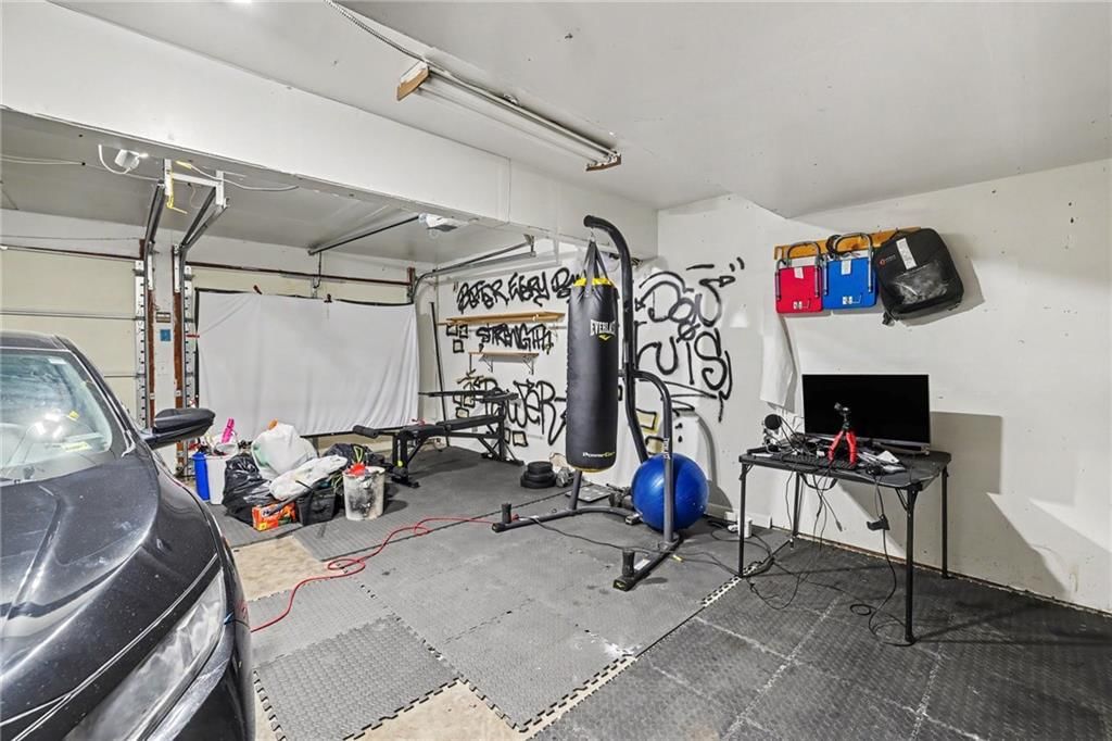 Workshop and home gym at 2018 E Mohawk Court, Olathe, KS 66062
