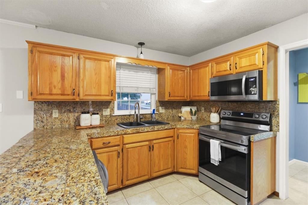 4301 NW Cortland Drive — photo 13