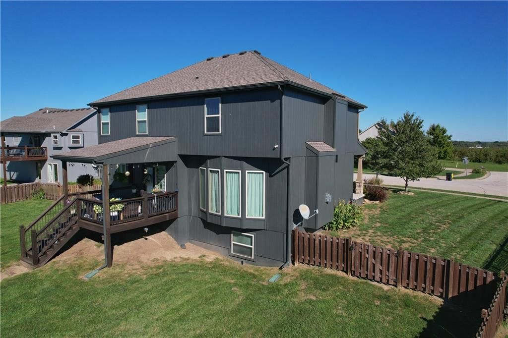 Deck and covered patio at 1100 N Sam Barr Drive, Kearney, MO 64060