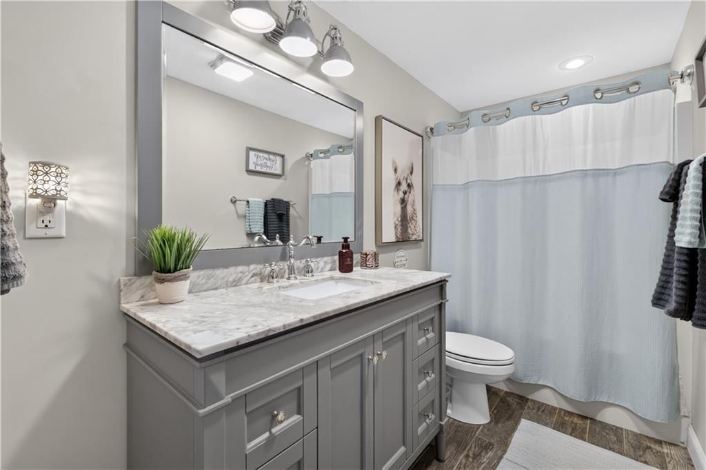 Tiled shower at 112 W Main Street, Freeman, MO 64746