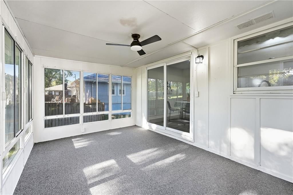 Sunroom and screened porch at 1913 N Plymouth Road, Independence, MO 64058