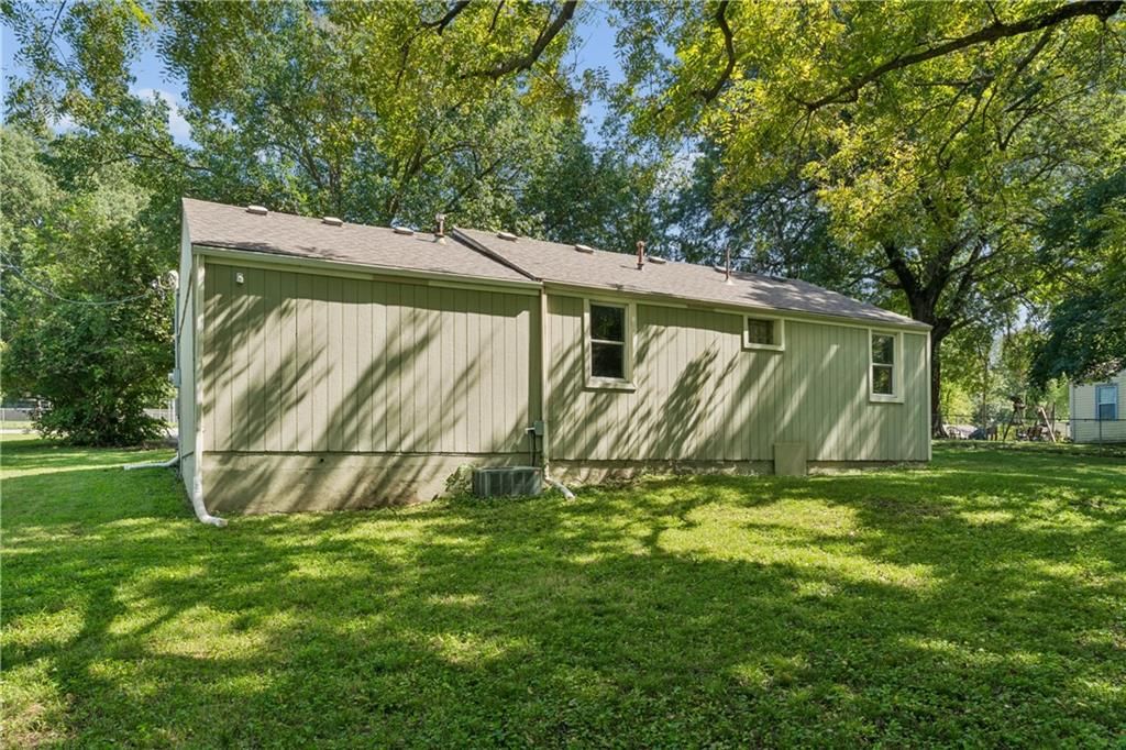 Big backyard, mature trees and flat lot at 5304 Maywood Avenue, Raytown, MO 64133