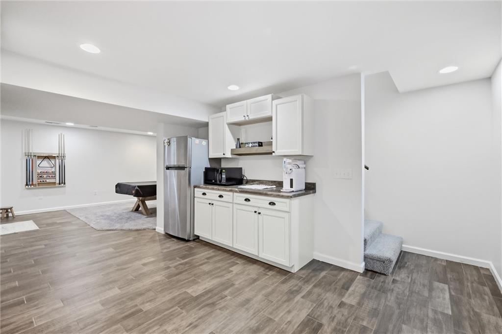 Finished basement and home office at 110 S Eastglen Drive, Raymore, MO 64083
