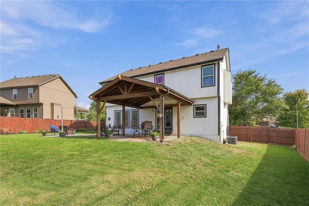 Fire pit at 110 S Eastglen Drive, Raymore, MO 64083