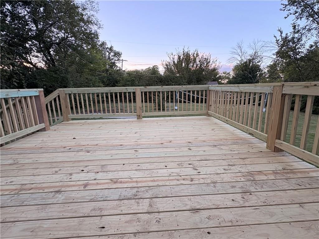 Deck, big backyard and wood deck at 6110 E 148TH Terrace, Grandview, MO 64030
