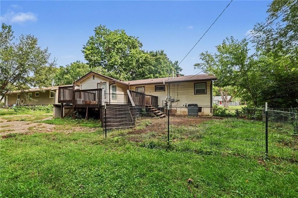 Fenced yard at 4411 E 138th Street, Grandview, MO 64030