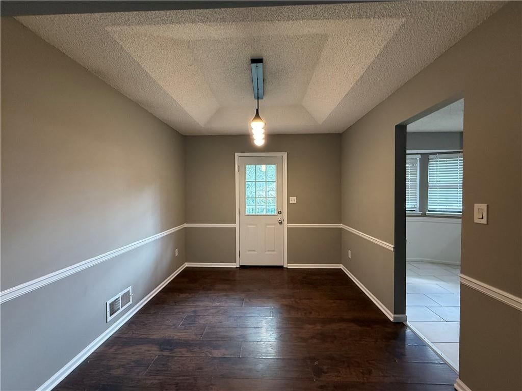Hardwood floors and gray walls at 1415 W Ferrel Drive, Olathe, KS 66061