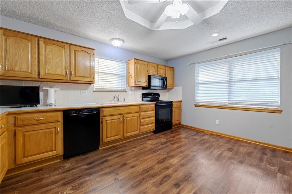 Photo 6 of 18 - 523 Mars Court, Raymore, MO 64083
