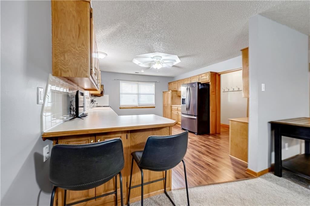 Photo 7 of 18 - 523 Mars Court, Raymore, MO 64083