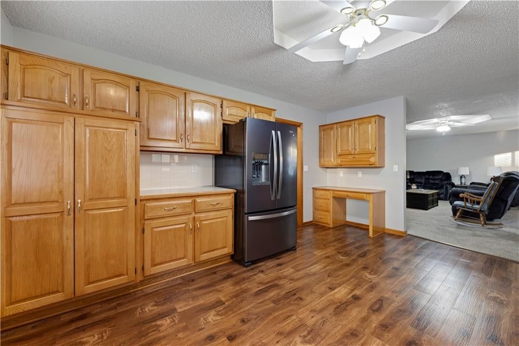 Photo 8 of 18 - 523 Mars Court, Raymore, MO 64083
