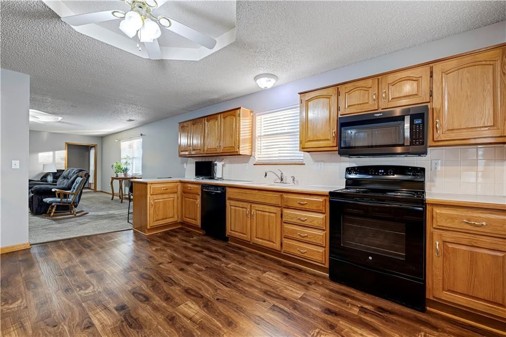 Photo 9 of 18 - 523 Mars Court, Raymore, MO 64083