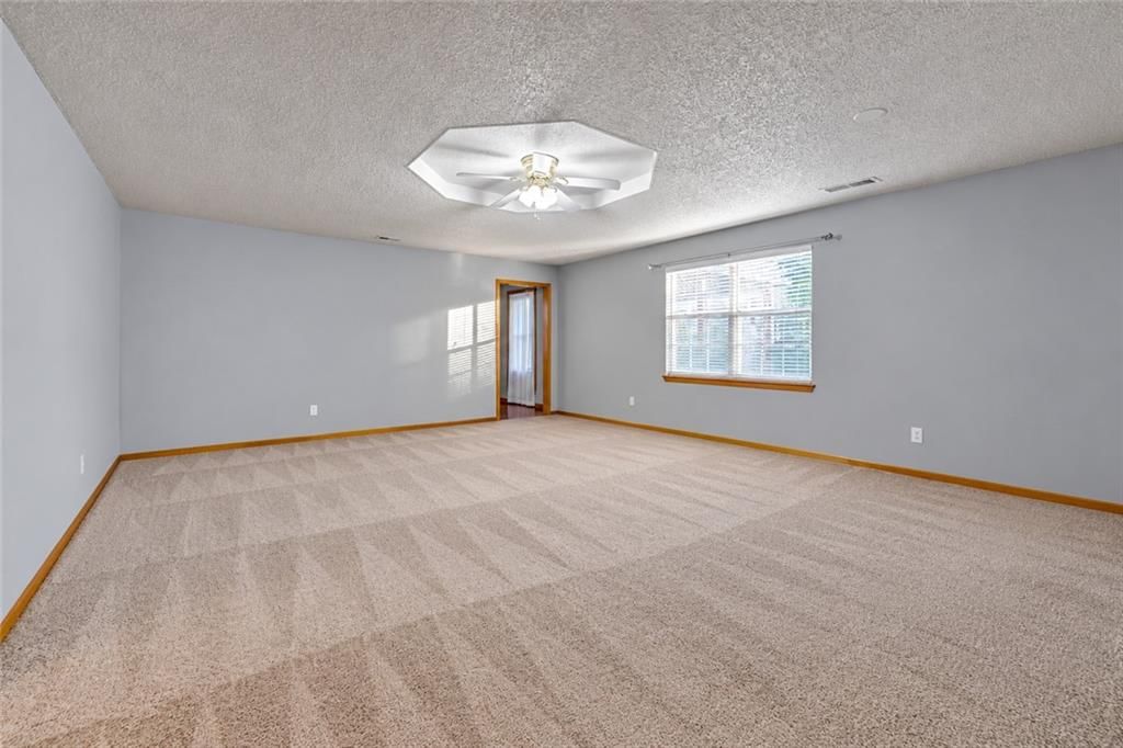Photo 11 of 18 - 523 Mars Court, Raymore, MO 64083