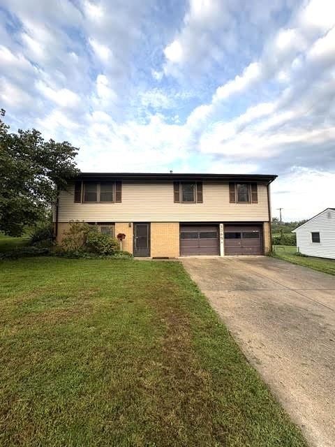 Mature trees and attached garage at 5360 N RICHMOND Avenue, Kansas City, MO 64119