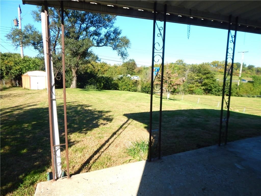 Big backyard, fenced yard and covered patio at 5360 N RICHMOND Avenue, Kansas City, MO 64119