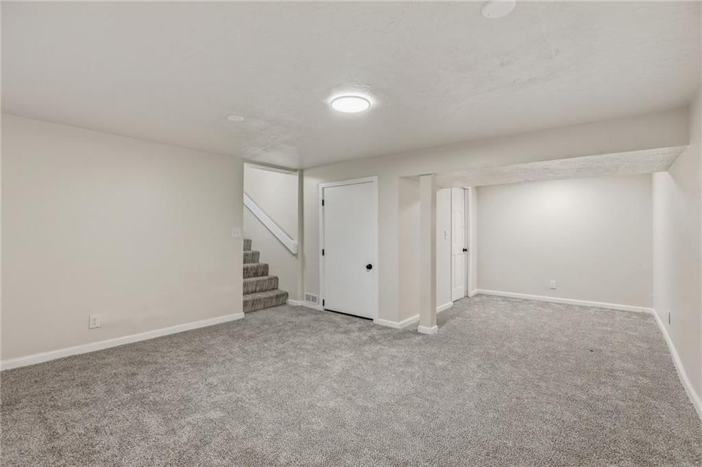 Finished basement at 408 N Kirk Avenue, Independence, MO 64050