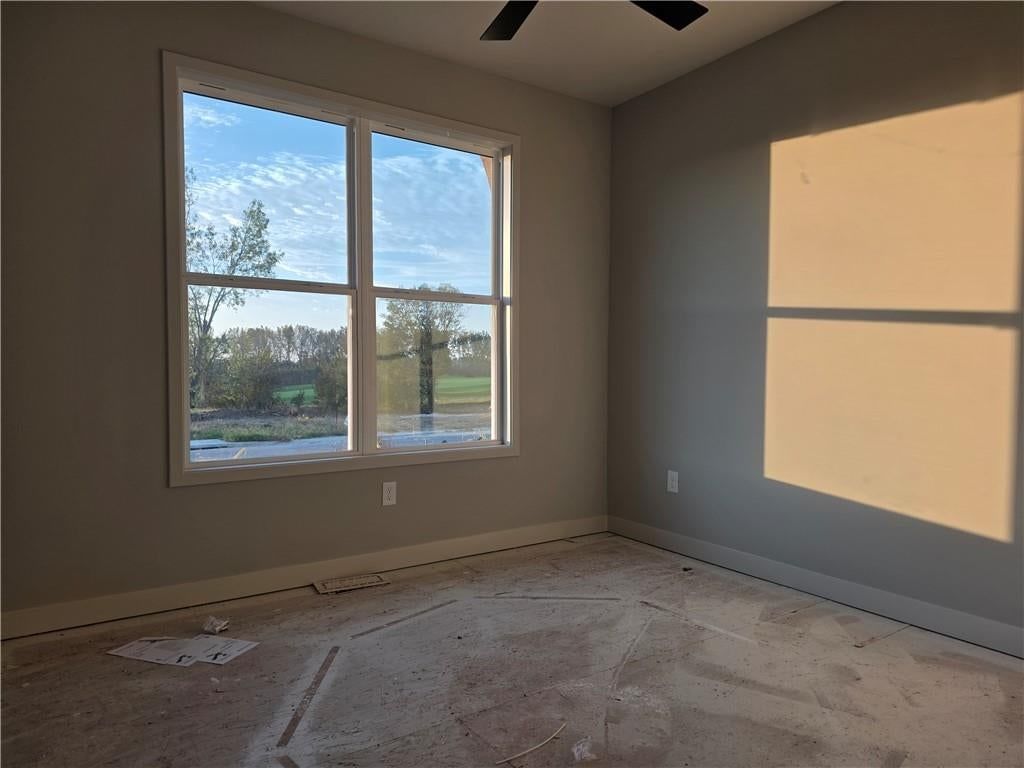 Wall of windows, white trim and gray walls at 14594 Amanda Lane, Basehor, KS 66007