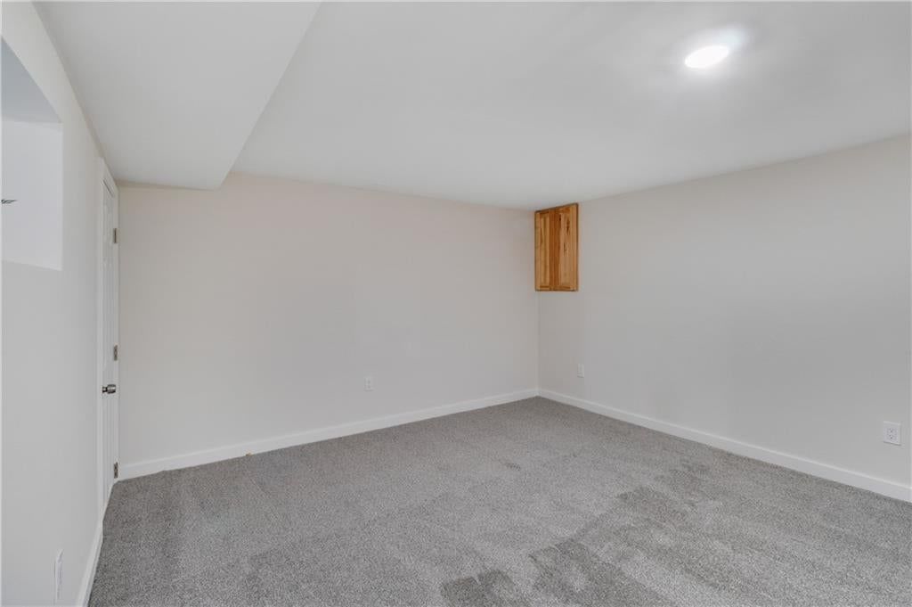 Finished basement, staircase and carpet at 8657 E 57th Street, Kansas City, MO 64129