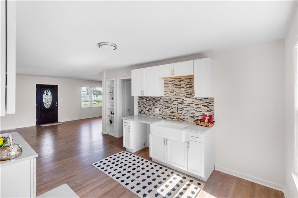 Photo 9: white kitchen cabinets, 8657 E 57th Street, Kansas City, MO 64129