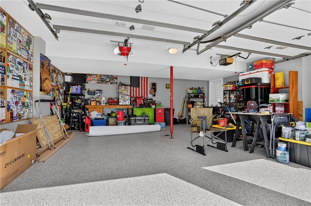 Workshop, epoxy garage floor and attached garage at 7608 NW 76th Place, Kansas City, MO 64152