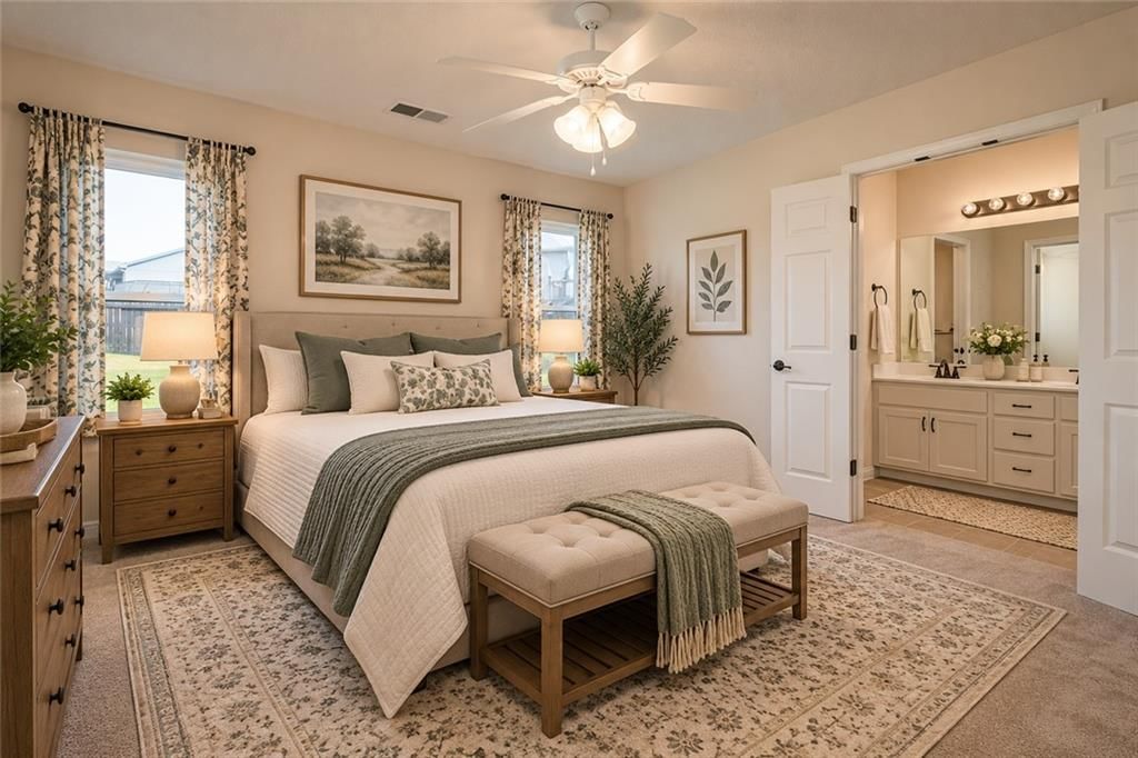 Main-floor primary bedroom at 101 Sun Garden Street, Blue Springs, MO 64064