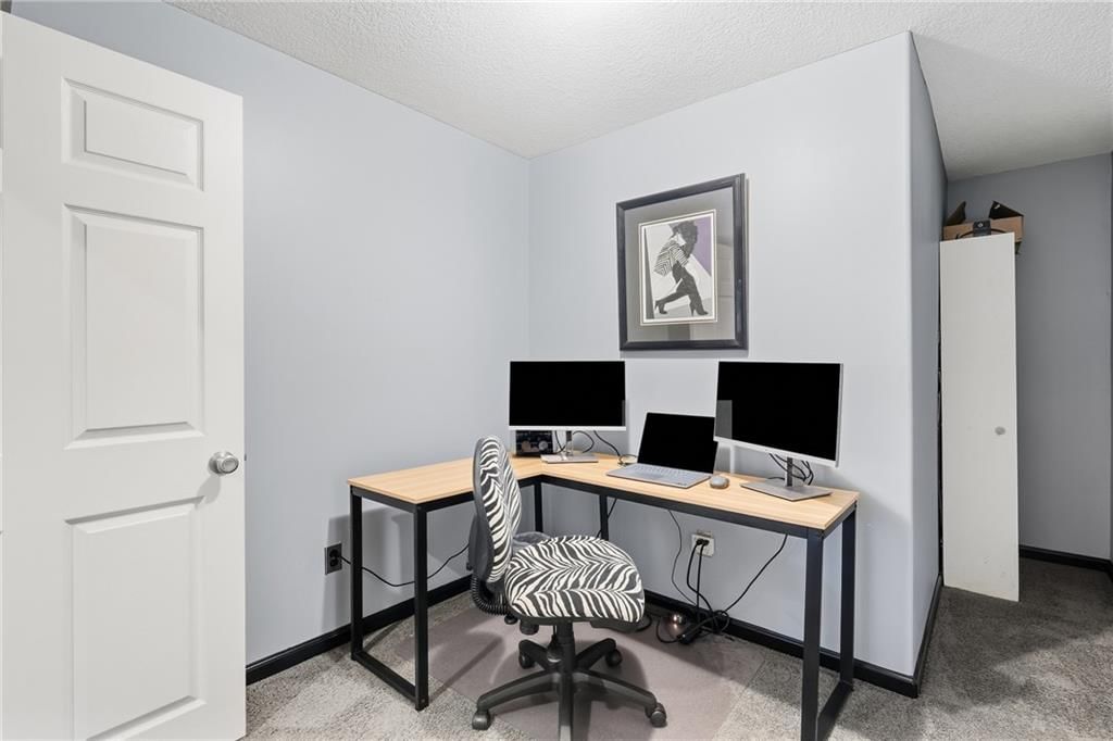 Home office at 10429 N Lawn Avenue, Kansas City, MO 64156
