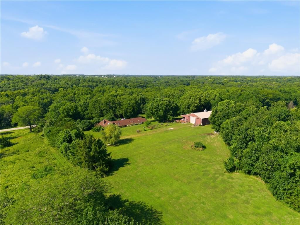 Big backyard, mature trees and flat lot at 30750 W 143rd Street, Gardner, KS 66030