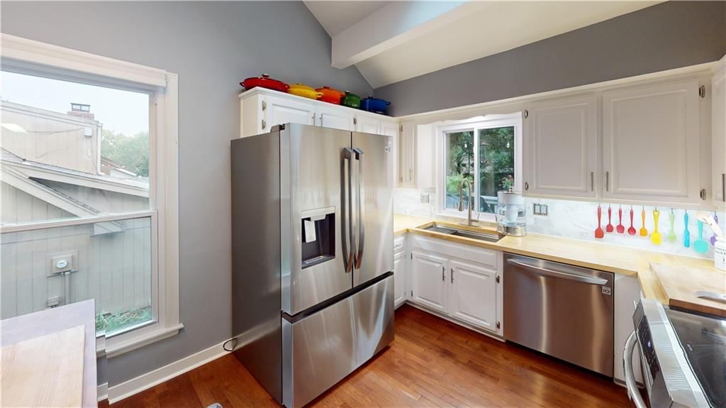 Photo 6: white kitchen cabinets, 14511 W 91st Street, Lenexa, KS 66215