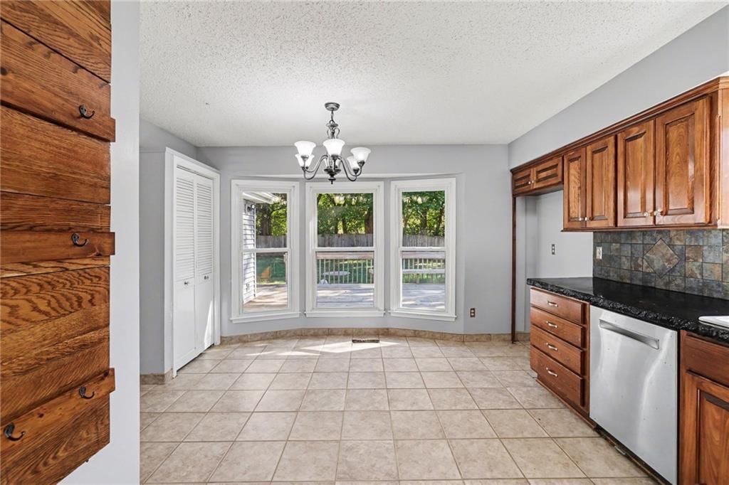 Chandelier and breakfast nook at 5755 RICHARDS Circle, Shawnee, KS 66216
