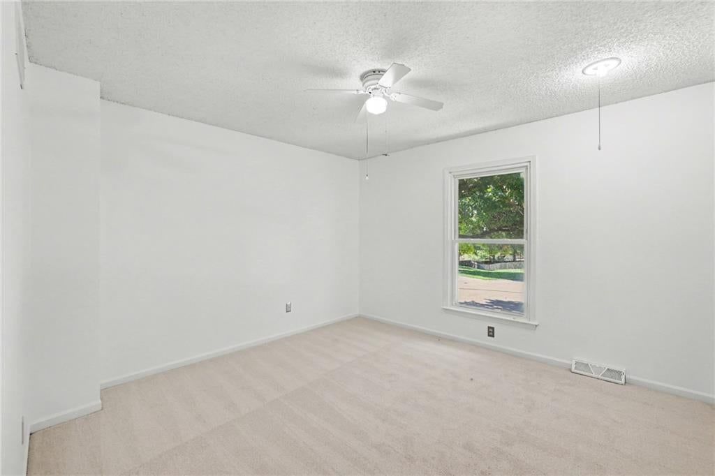 Mixed-finish hardware and carpet at 5755 RICHARDS Circle, Shawnee, KS 66216