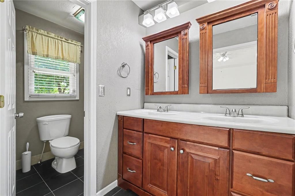 Double vanity and wood vanity at 5755 RICHARDS Circle, Shawnee, KS 66216