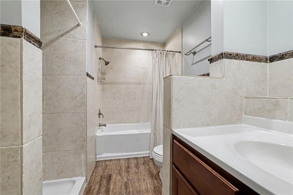 Walk-in shower and tiled shower at 5755 RICHARDS Circle, Shawnee, KS 66216