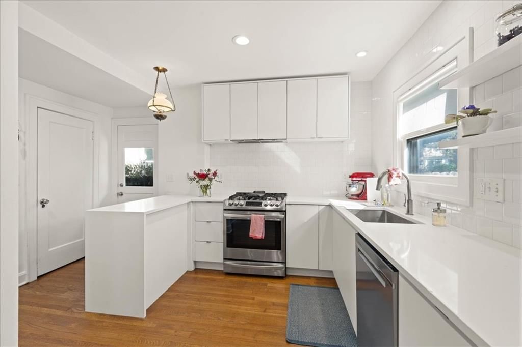 Photo 12: kitchen island, 7205 Madison Avenue, Kansas City, MO 64114