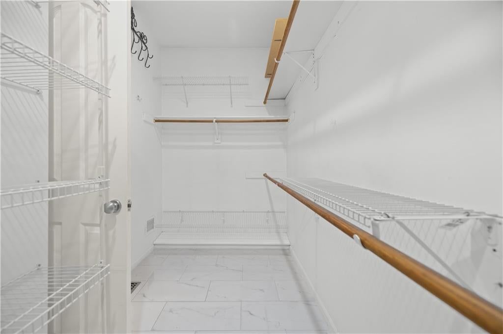 Finished basement, tile floors and wet bar at 20306 W 99th Terrace, Lenexa, KS 66220